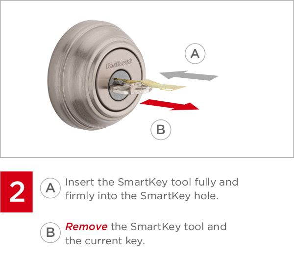 Insert the SmartKey tool fully and firmly into the SmartKey hole. Then remove the SmartKey tool and the current key.