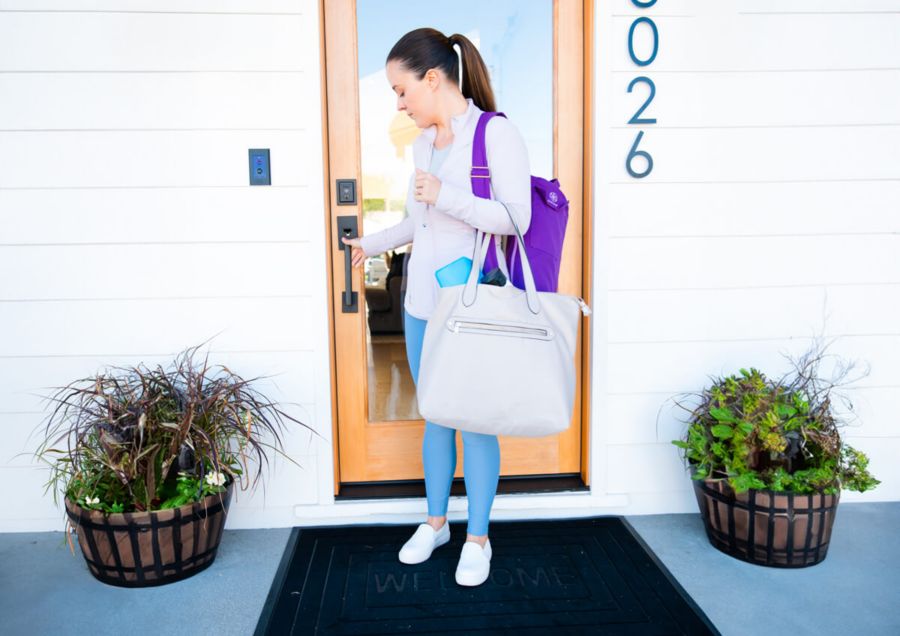 Woman closing door